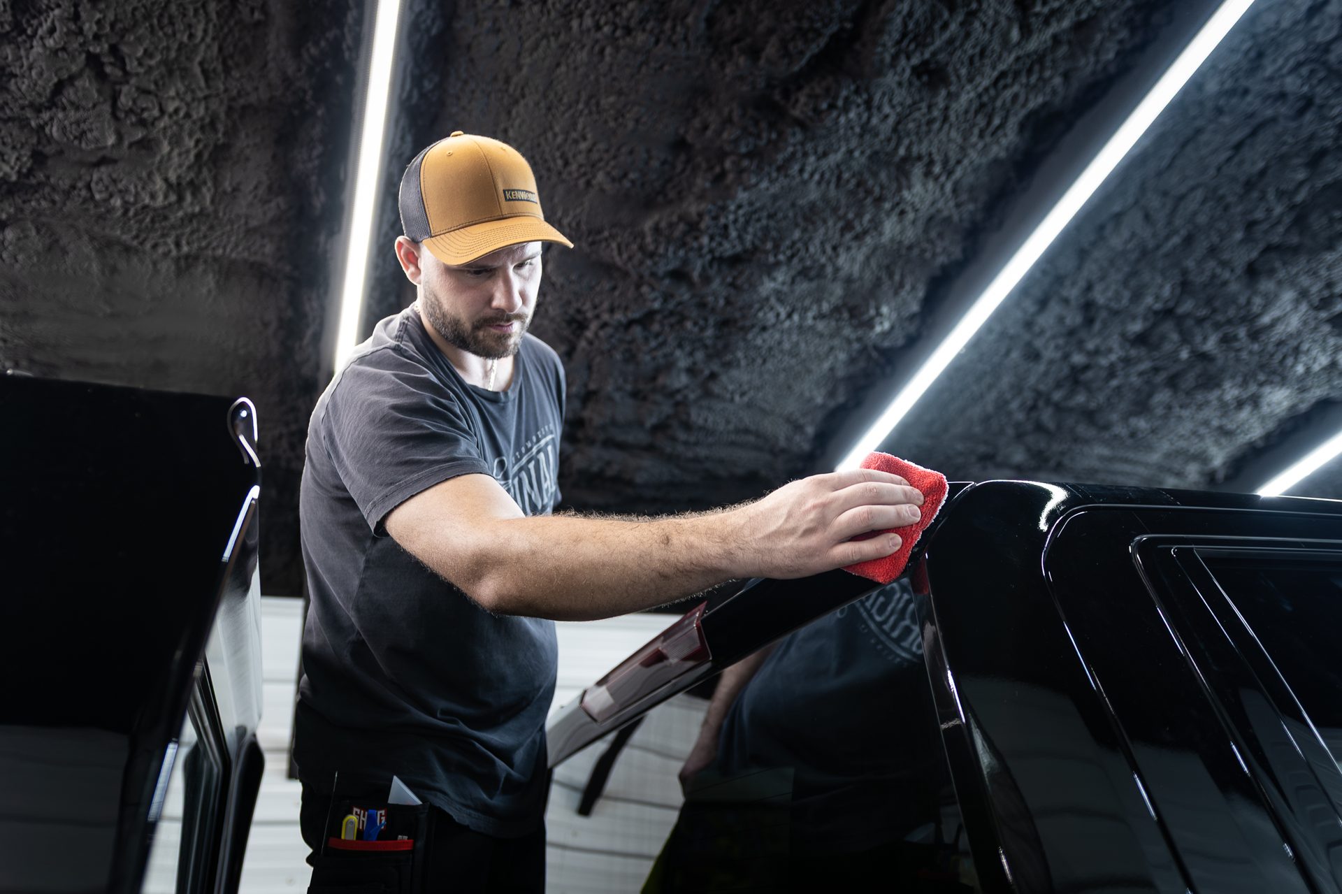 Precision detailing work under the studio lights
