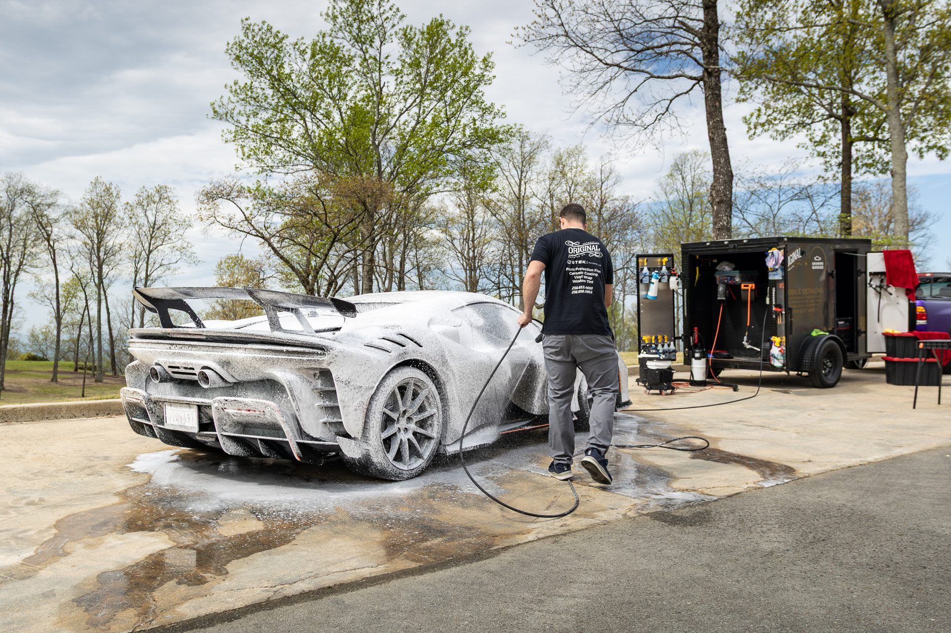 McLaren being washed at a premium detailing studio